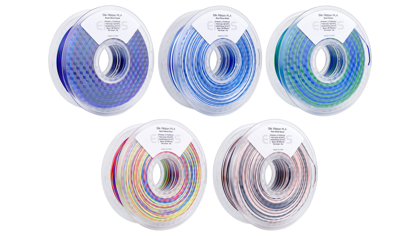 Five EIBOS Artism Series II Ribbons PLA filament spools showing black, blue, purple, silver, white, green, red, yellow and pink colour combinations.