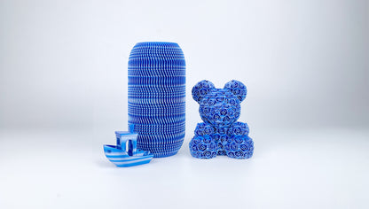 Blue, silver and white vase, teddy bear and Benchy boat 3D printed with EIBOS Artism Series II Ribbons PLA filament.