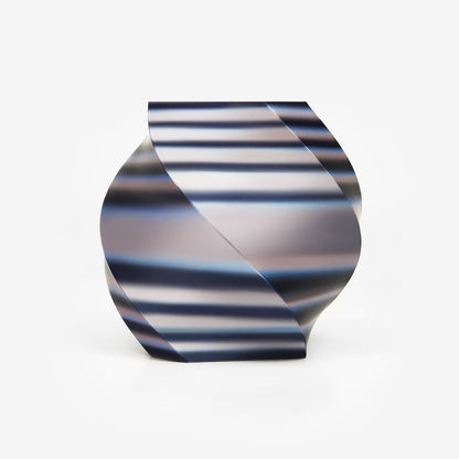 Twisted vase 3D printed with EIBOS Artism Series II Ribbons PLA in pink, white and black, showing its glossy striped colour effect.