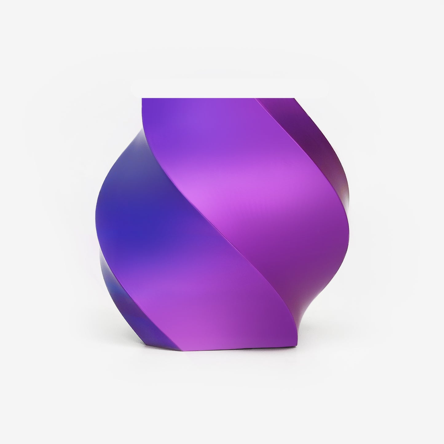 Twisted vase 3D printed with EIBOS Silk Series Blue–Fuchsia dual-colour PLA filament, showing its glossy colour-changing finish.