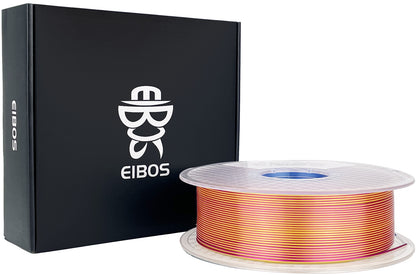 EIBOS Silk Series Gold–Red dual-colour PLA filament spool displayed beside its branded black packaging.